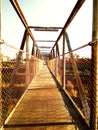 Metallic bridge of an old disused train station, abandoned to the elements Royalty Free Stock Photo