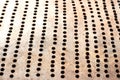 Metallic bronze textured background with pattern of round cells in line Royalty Free Stock Photo