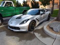 Metallic Chevrolet Corvette (C7) on the asphalt outdoors