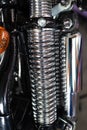 Metallic chrome custom hydraulic shock absorber or rear suspension shock motorcycle part detailed