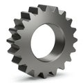 A metallic cogwheel with evenly spaced, rectangular teeth, standing upright on a plain Royalty Free Stock Photo