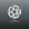 Metallic cogwheels metal surface on gray background