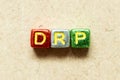 Metallic alphabet letter block in word DRP Abbreviation of Disaster recovery plan, Distribution resource planning, Dividend