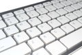 Metallic computer keyboard with white QWERTY keys