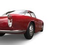 Metallic crimson red old school muscle car - rear view Royalty Free Stock Photo