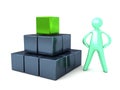 Metallic Cubes Pyramid with a cartoon man Royalty Free Stock Photo