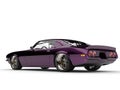 Metallic dark purple beautiful vintage American classic car - rear view Royalty Free Stock Photo