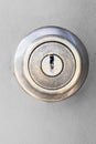 Metallic door lock and keyhole on door background Royalty Free Stock Photo