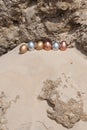 Metallic Easter Eggs on a cliff Royalty Free Stock Photo