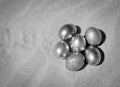 Metallic Easter Eggs in the sand Royalty Free Stock Photo