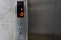 Metallic elevator panel with button and led display.  Interior and closeup of metal buttons in elevator Royalty Free Stock Photo