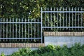 Metallic fence on a little brick wall Italy, Europe