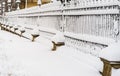 Metallic fence with snow. Metal fence in winter covered with snow. .Snowy environment in the morning