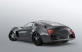 Metallic gray sports car on gray background
