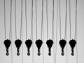 Metallic group of hooks with black wires photo