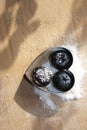 Metallic heart duet container jumbo blueberries on granulated bed of sugar free sweetener on wooden board Royalty Free Stock Photo