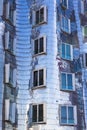 Metallic house with blue windows, modern architecture