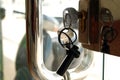 Metallic key inserted in doorknob