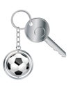 Metallic key with soccer ball keyholder Royalty Free Stock Photo