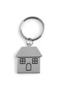 Metallic keychain in shape of house isolated on white, above view Royalty Free Stock Photo