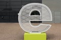 Metallic letter E