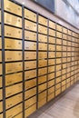 Metallic letter mailbox rows in postal room facilities of condominium