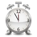 A metallic mechanical realistic alarm clock, a clock showing at five minutes twelve, midnight or lunch Royalty Free Stock Photo