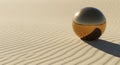 Metallic orb rests on vast rippling sand dunes Royalty Free Stock Photo