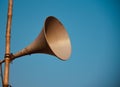 Metallic outdoor loud speakers with sky background photo
