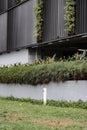 Metallic outdoor water tap on the grassy ground in the street