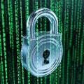 A metallic padlock sits against a backdrop of cascading green numerical code, Royalty Free Stock Photo