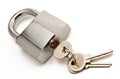 Metallic padlock with three keys in keyhole