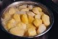 Metallic pan full inside of potato for soup.