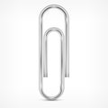 Metallic paperclip on white