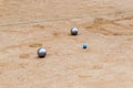 Metallic petanque balls and jack ball Royalty Free Stock Photo