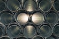 Metallic Pipes stacked in rows pattern Royalty Free Stock Photo