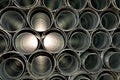 Metallic Pipes stacked in rows pattern Royalty Free Stock Photo