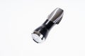 Metallic portable LED flashlight isolated on white Royalty Free Stock Photo