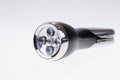 Metallic portable LED flashlight isolated on white Royalty Free Stock Photo