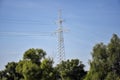 Metallic pylon of high-voltage power lines against blue sky Royalty Free Stock Photo