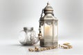 A metallic Ramadan lamp lantern with Islamic rosary beads on white background Royalty Free Stock Photo