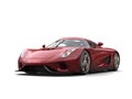 Metallic red modern super race car - studio shot Royalty Free Stock Photo