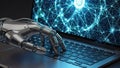 Metallic robot hand typing on a laptop keyboard with a glowing blue digital network displayed on the screen Royalty Free Stock Photo