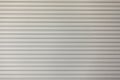 Metallic roll shutter door