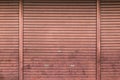 Metallic roller shutter door