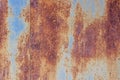Metallic blue background is almost entirely covered with rust, Royalty Free Stock Photo