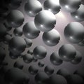 Metallic shiny balls on a silvery gray gradient background.
