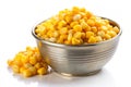 Silver Bowl and Scattered Sweet Corn Kernels on White Background food ingredient Royalty Free Stock Photo