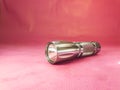 metallic silver pocket mini old flashlight Royalty Free Stock Photo