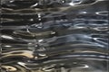 Metallic silver wavy background Royalty Free Stock Photo